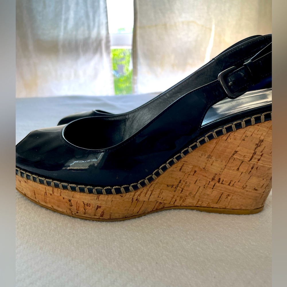 Stuart Weitzman black patten leather and cork, peek toe wedges.  Worn once